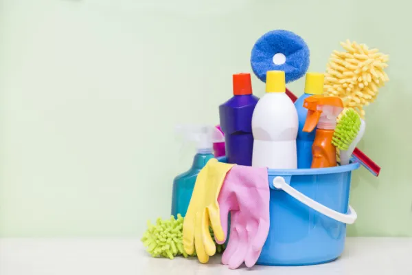 House cleaning supplies in a bucket