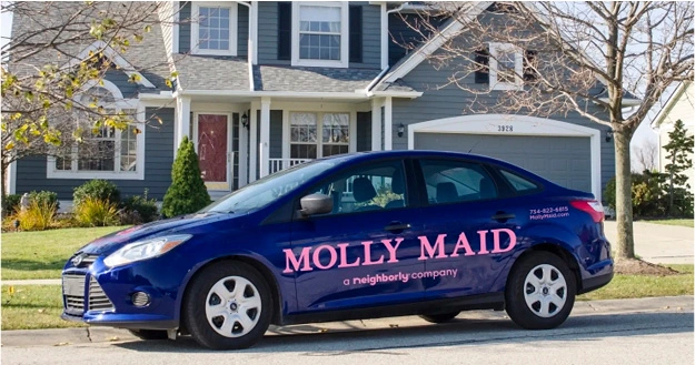 Molly Maid branded car.
