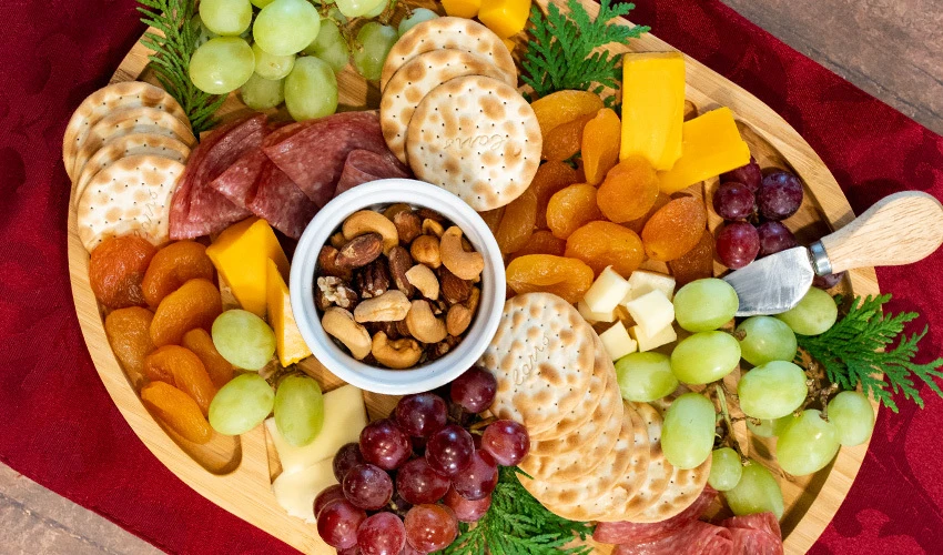 Fruit, nut, cracker, and cheese platter
