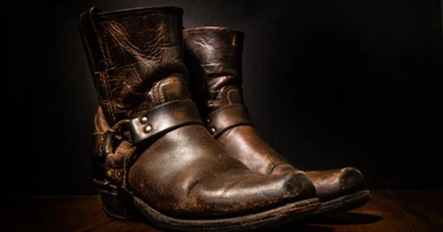 Pair of brown well-worn leather boots
