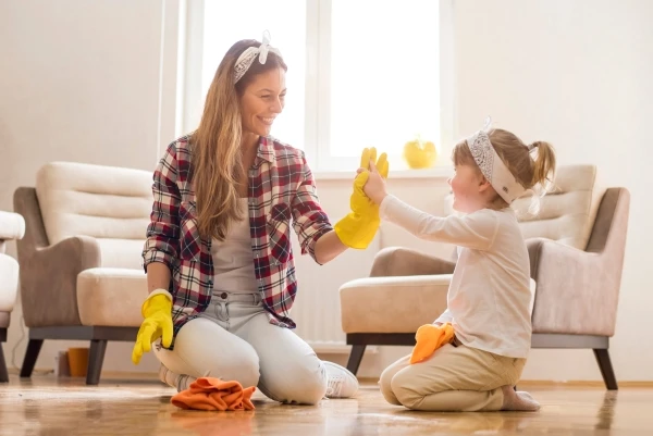 Woman and child cleaning