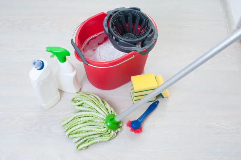 Bucket, mop, and cleaning solution for linoleum floors