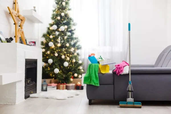 Cleaning supplies in living room with Christmas decorations