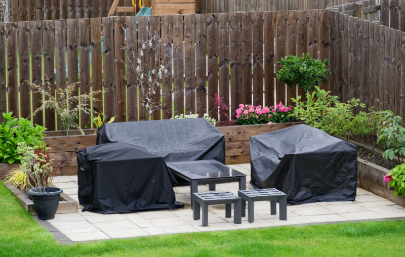 Patio furniture covered for weather outside
