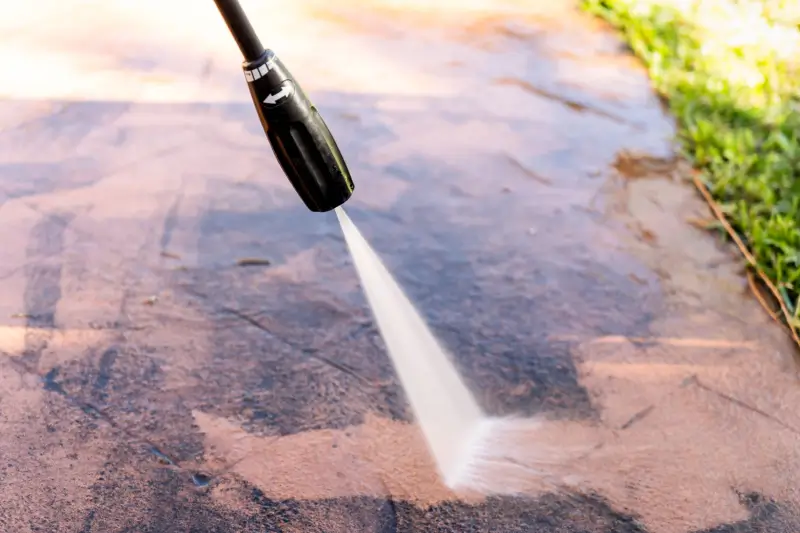 Power washing stain cement stains.