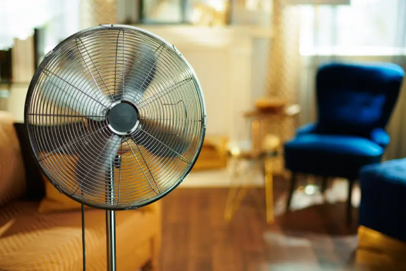 Closeup on clean floor standing fan