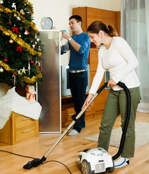 woman mopping a wood floor