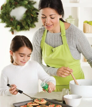 Mother and daughter cooking a holiday dinner