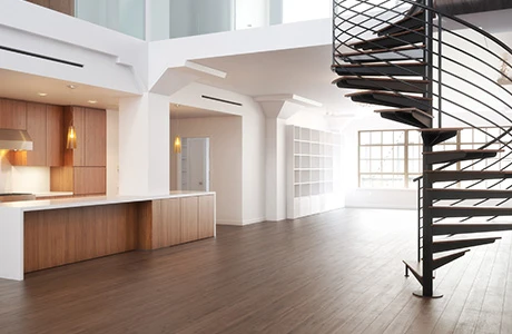modern open concept building with winding staircase
